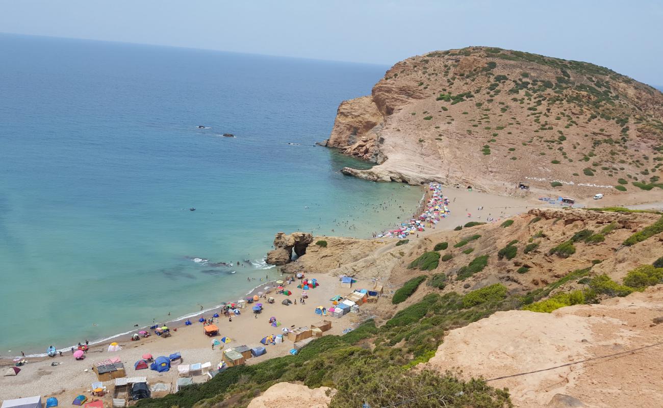 Foto de Ourdania Plage con arena fina y guijarros superficie