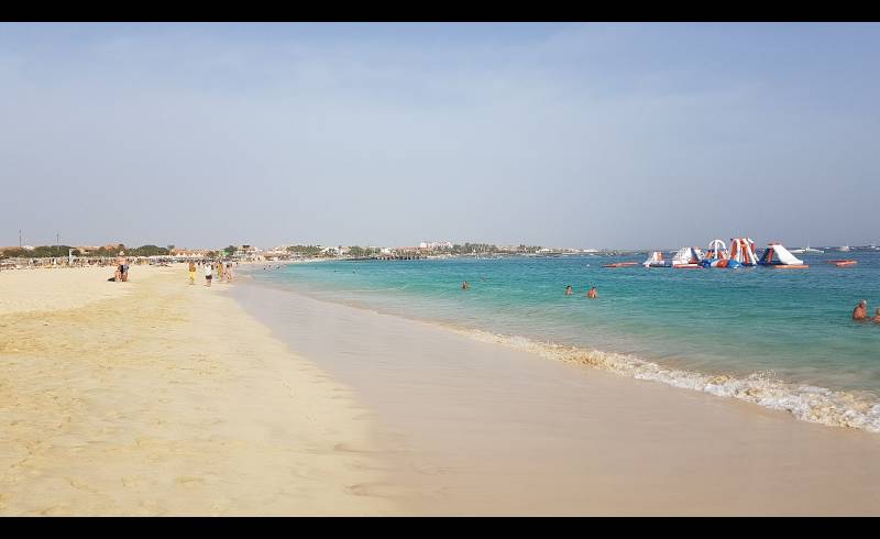 Foto de Playa de Kite con brillante arena fina superficie