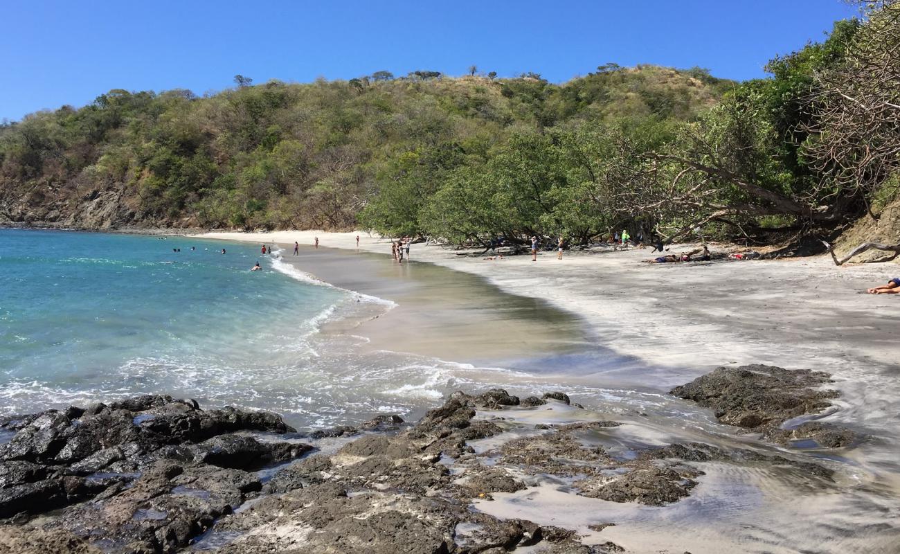 Foto de Dantita Beach con brillante arena fina superficie