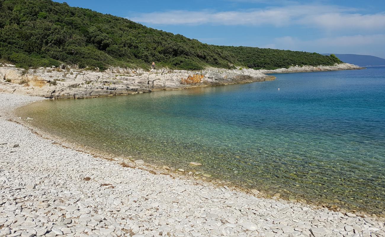 Foto de Cava beach con guijarro ligero superficie