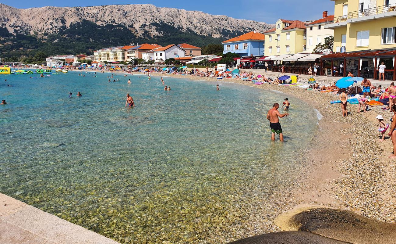 Foto de Playa de Vela con guijarro fino claro superficie