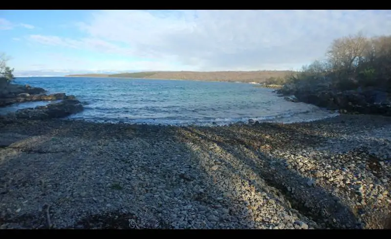 Foto de Pero beach II con guijarro ligero superficie