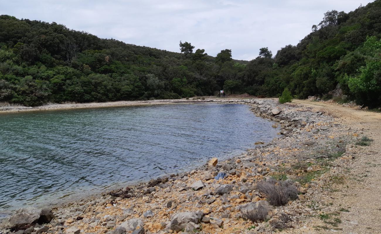 Foto de Dundo beach con piedra superficie