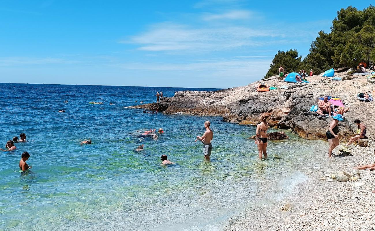 Foto de Playa Pinizule con guijarro ligero superficie