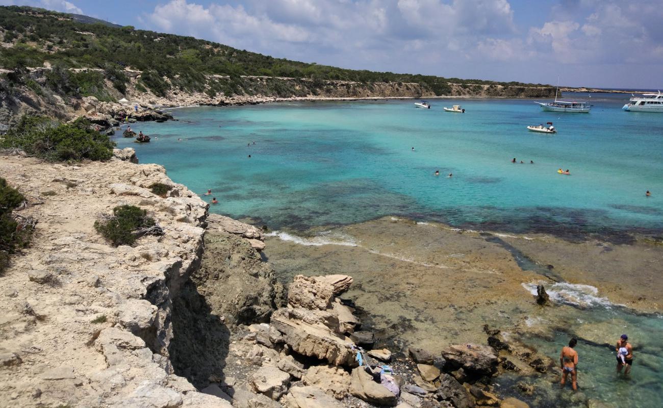 Foto de Playa Blue Lagoon con brillante arena fina superficie