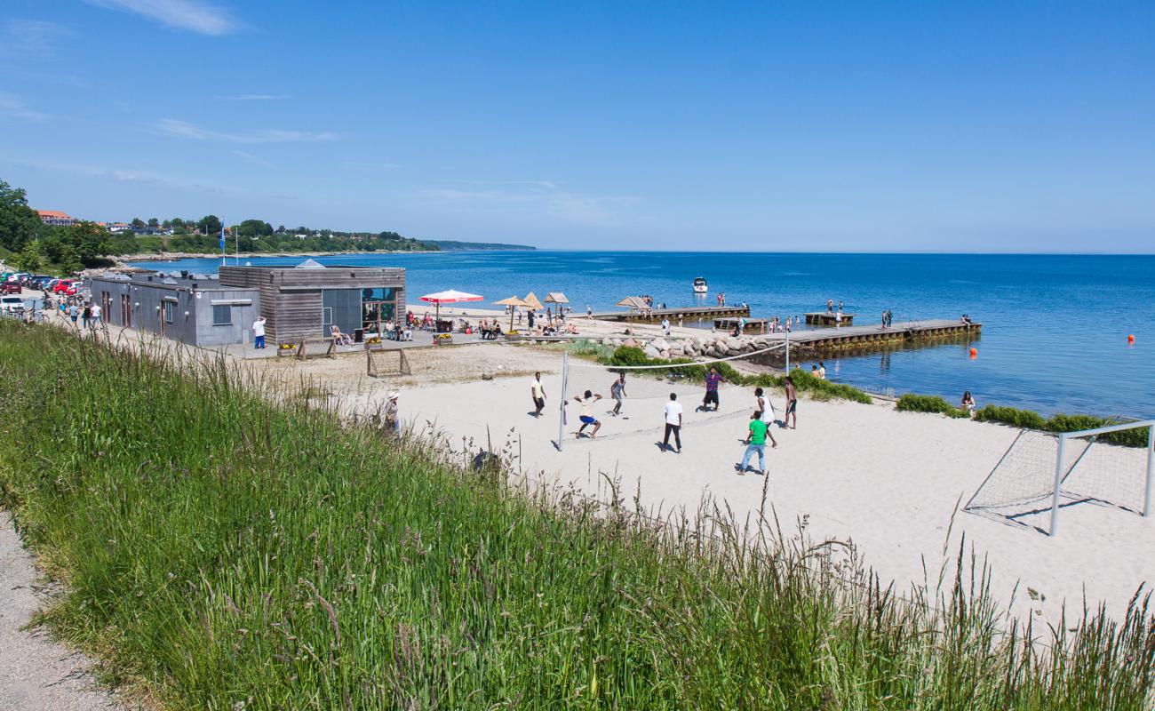 Foto de Oster Beach con arena brillante superficie