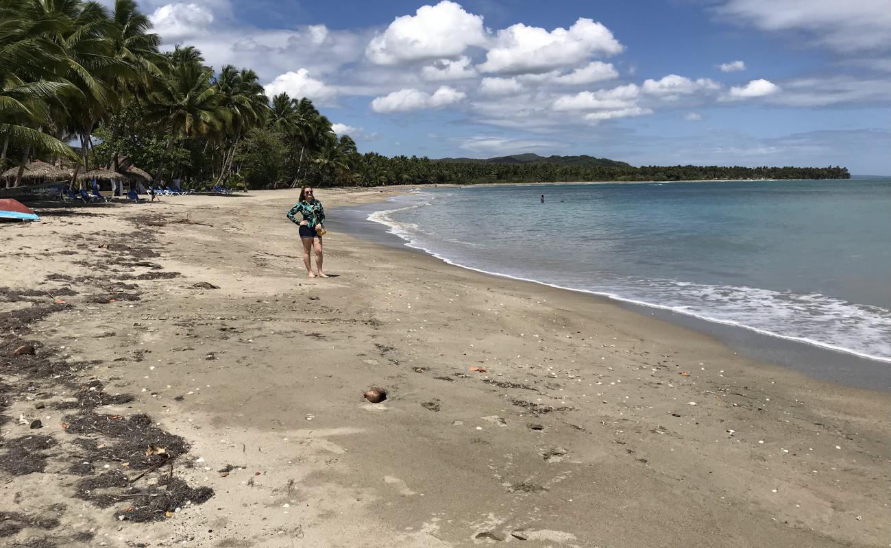 Foto de Playa Magante con arena brillante superficie