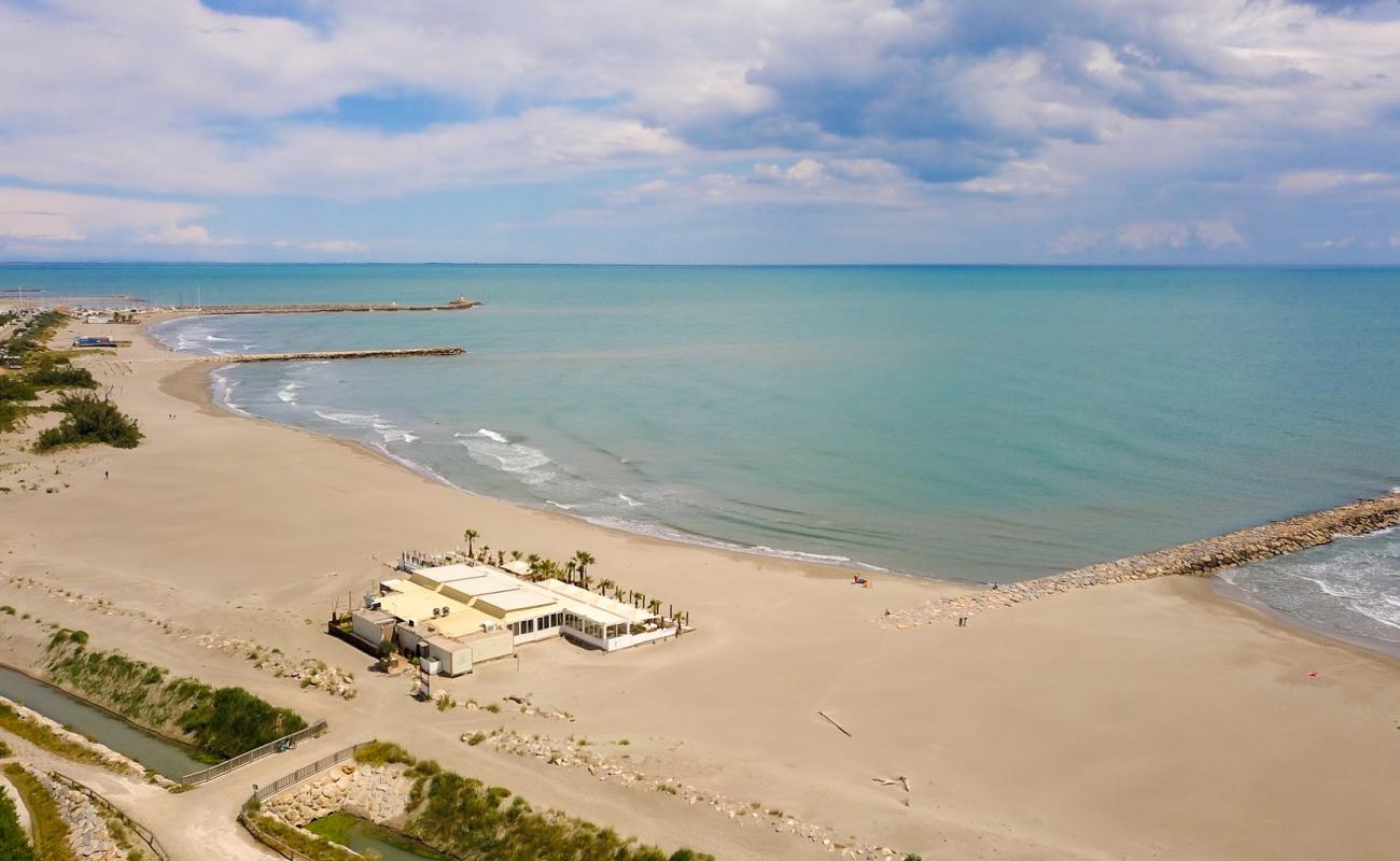 Foto de Farniente Plage con brillante arena fina superficie