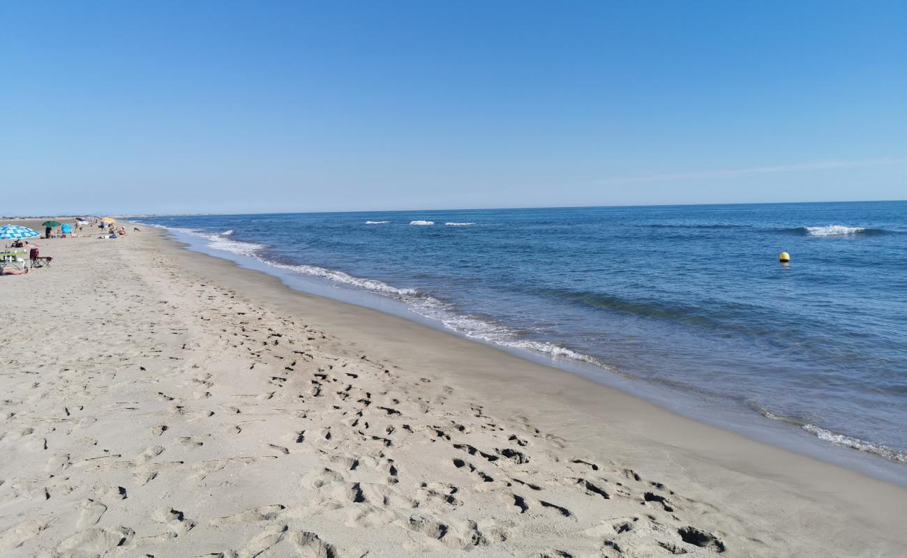 Foto de Playa Piemanson con arena brillante superficie