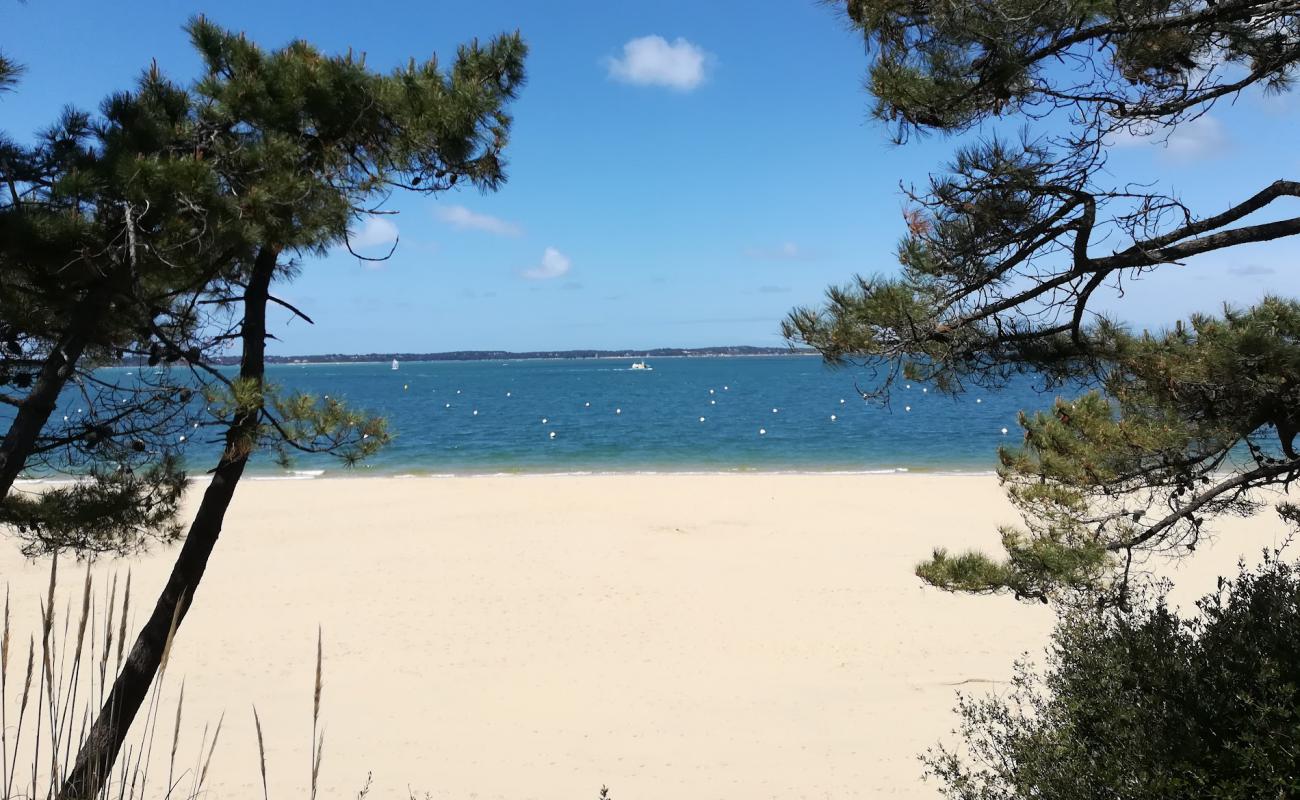 Foto de Playa Pereire con arena fina blanca superficie