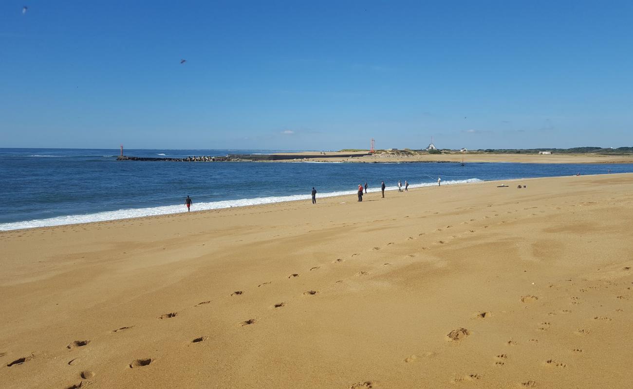 Foto de Plage de Kerminihy con arena brillante superficie