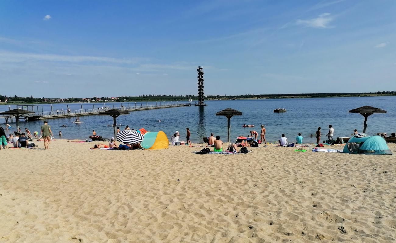 Foto de Strand am Pegelturm con arena brillante superficie