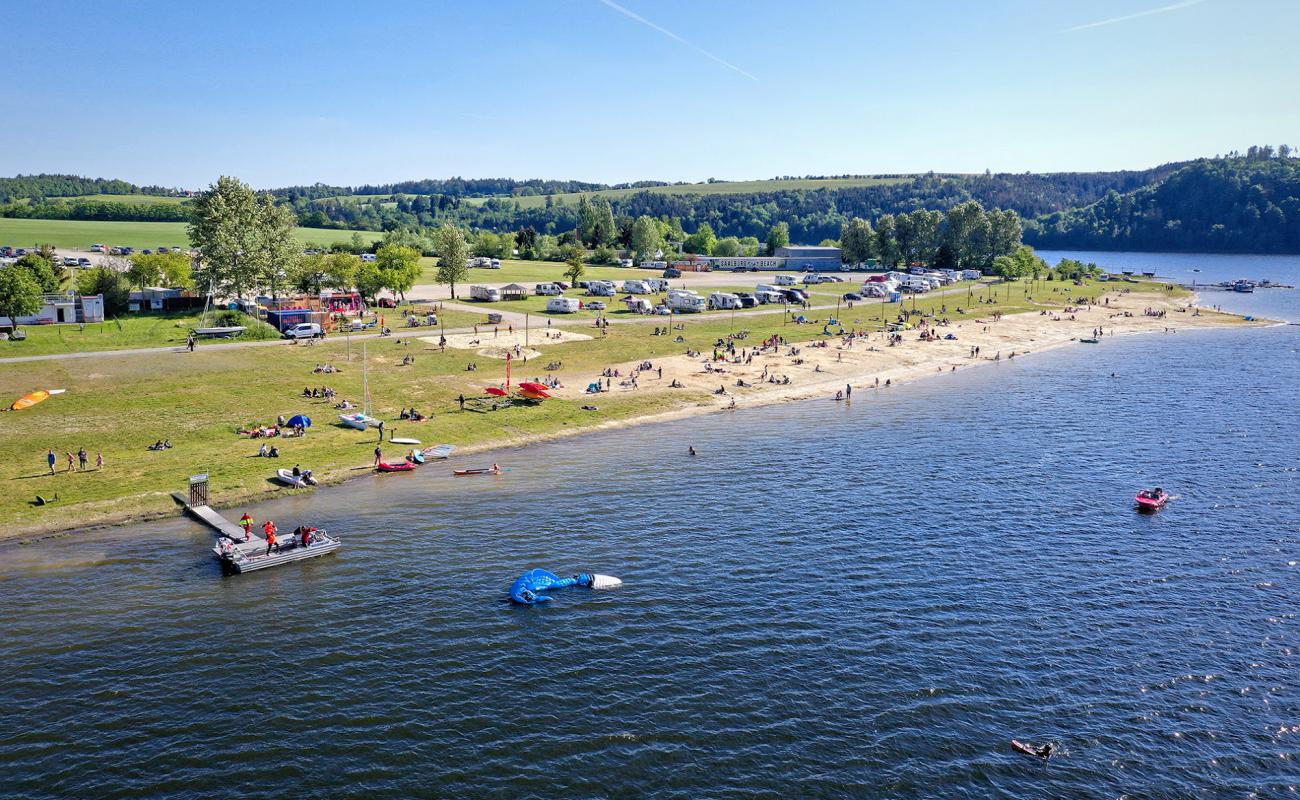 Foto de Playa de Saalburg con arena brillante superficie