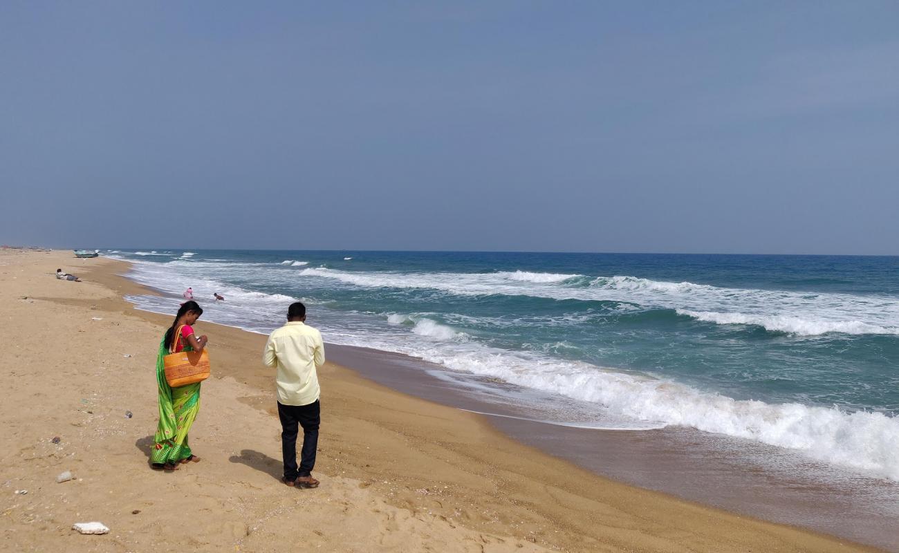 Foto de Pazhaverkadu Beach con arena brillante superficie