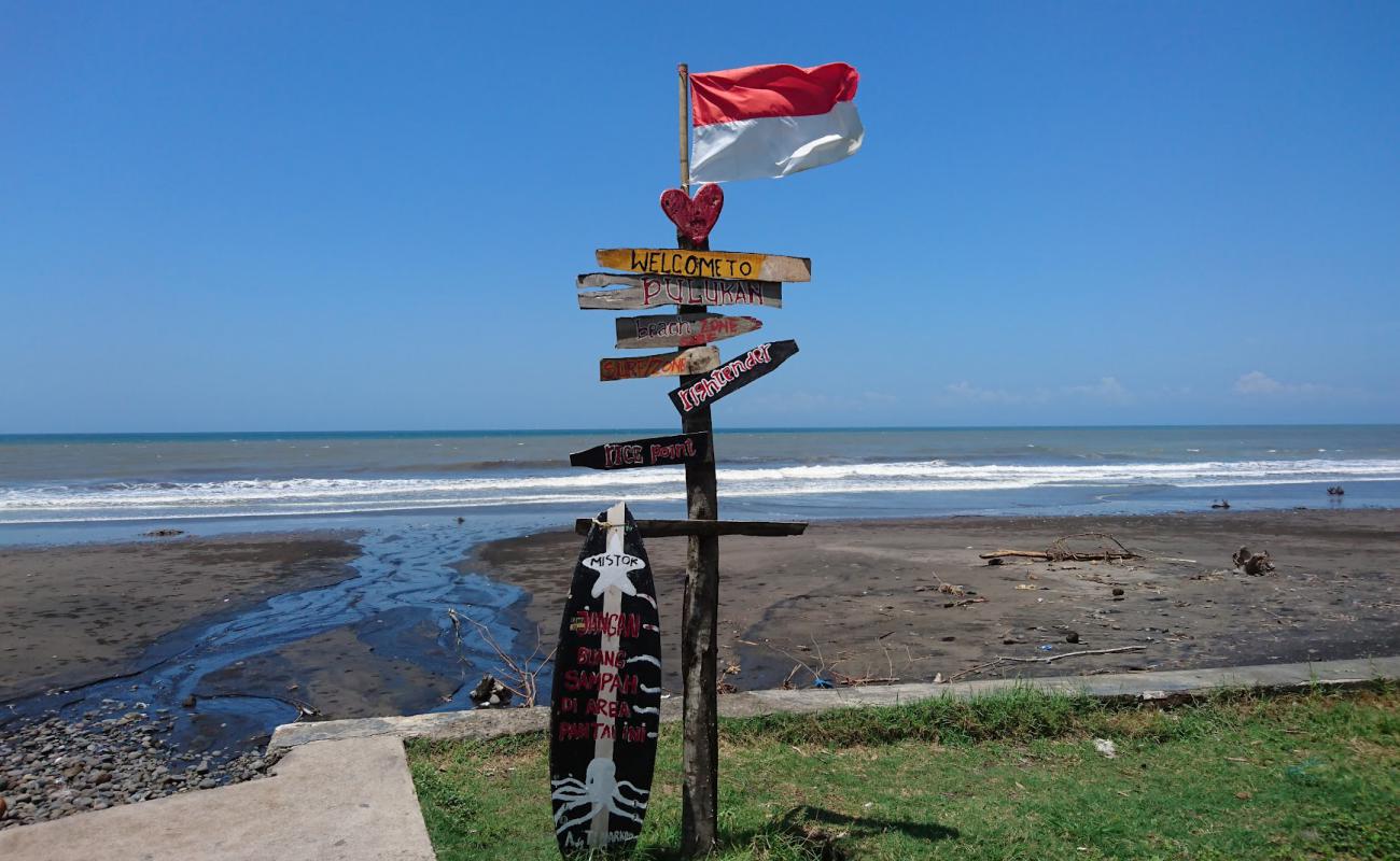 Foto de Pangkung Jukung Beach con arena oscura superficie