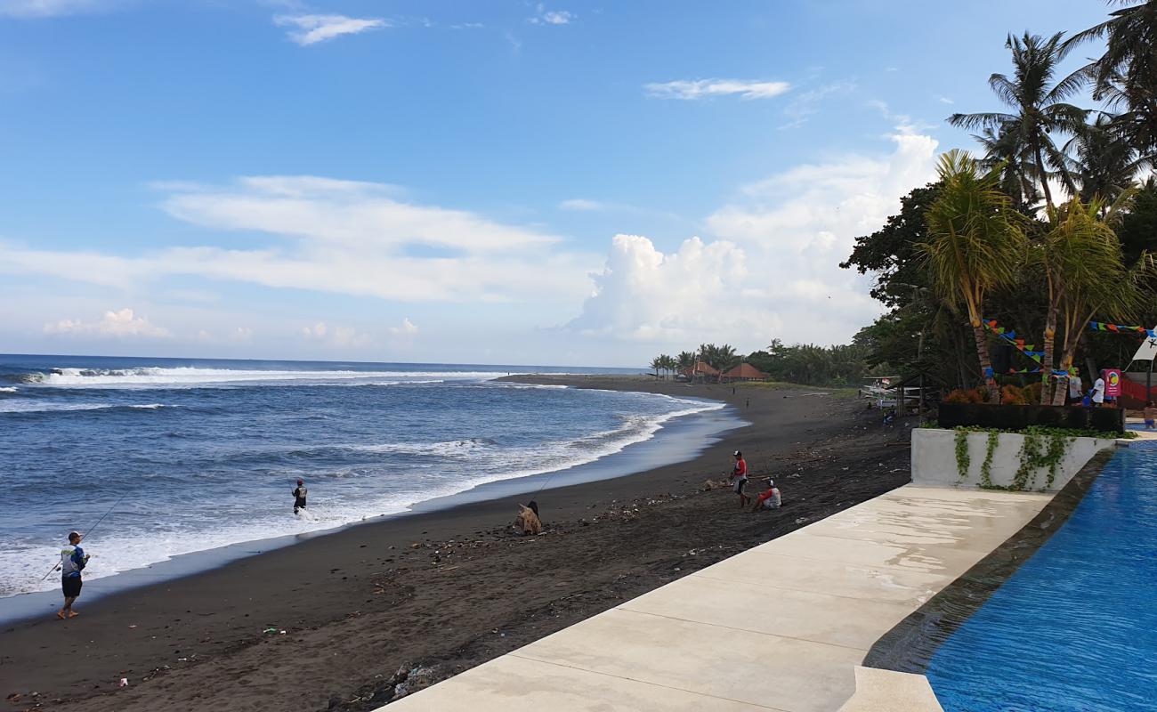 Foto de Saba Beach con arena gris superficie