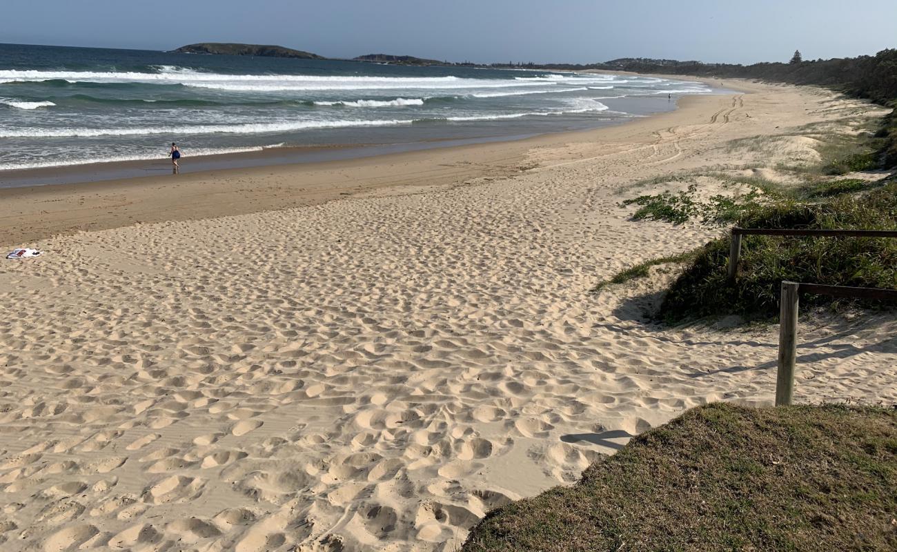 Foto de Macauleys Headland Beach con brillante arena fina superficie