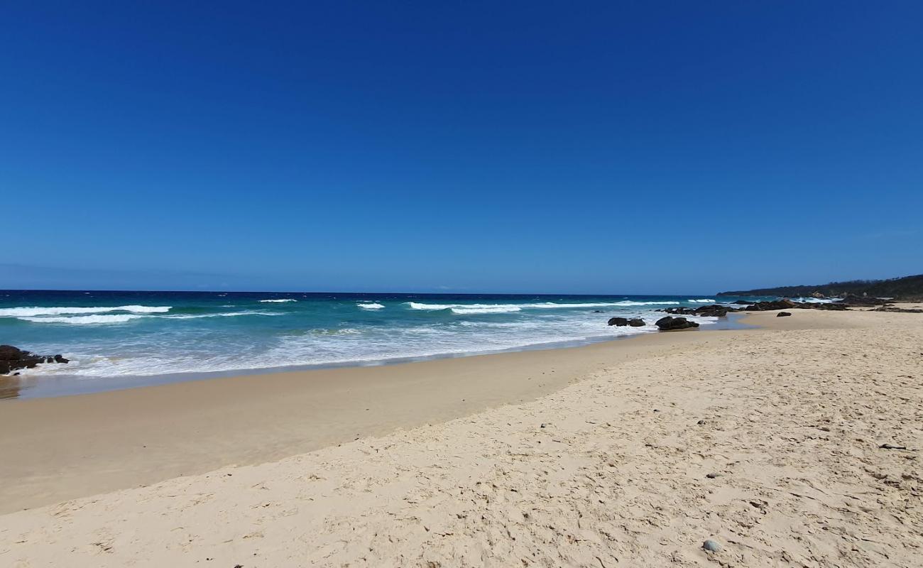 Foto de Quarry Beach con arena brillante superficie