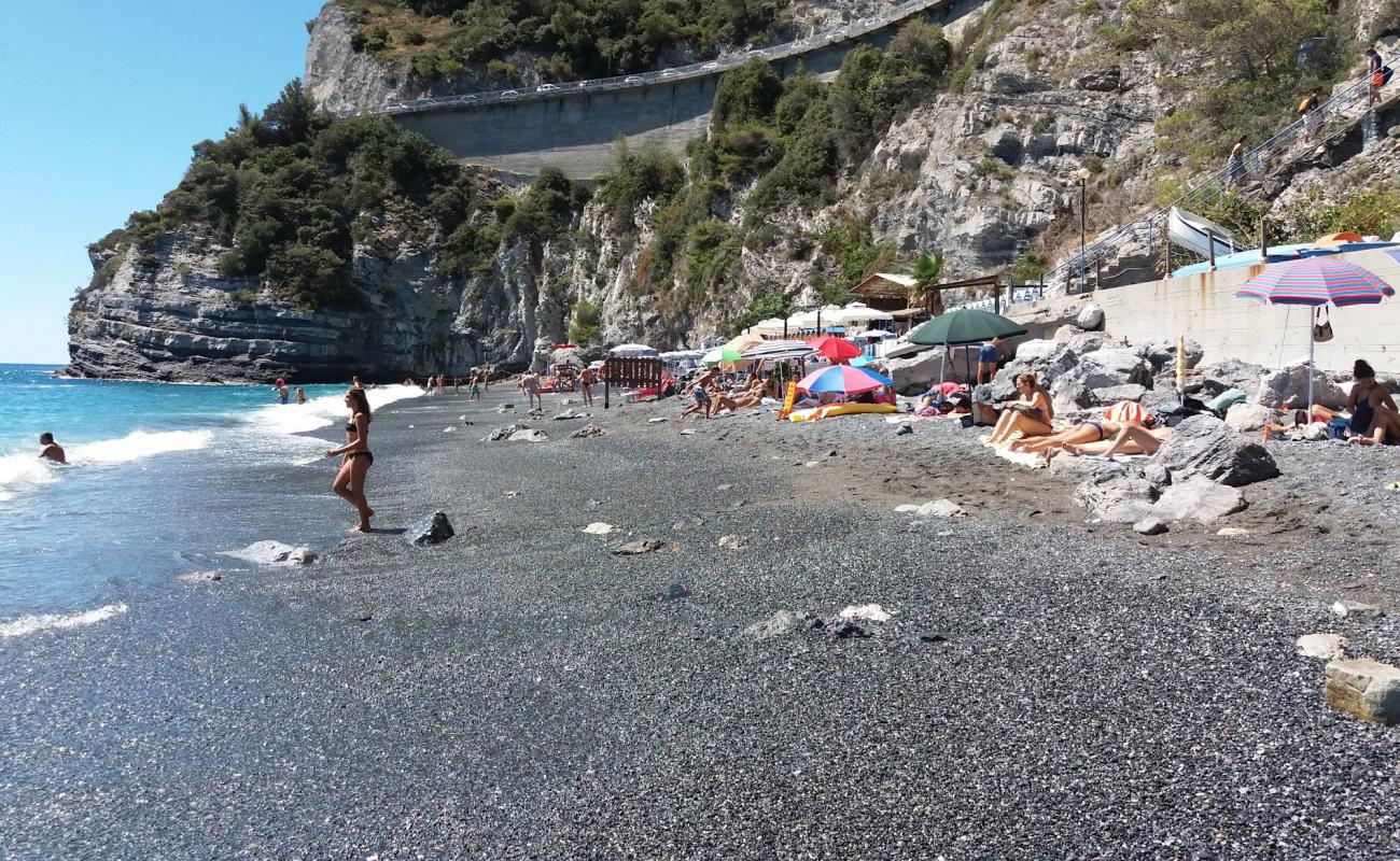 Foto de Sirene beach con guijarro fino oscuro superficie