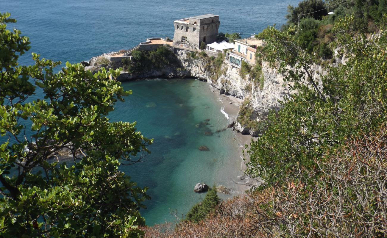 Foto de Spiaggia del Cauco con guijarro fino gris superficie