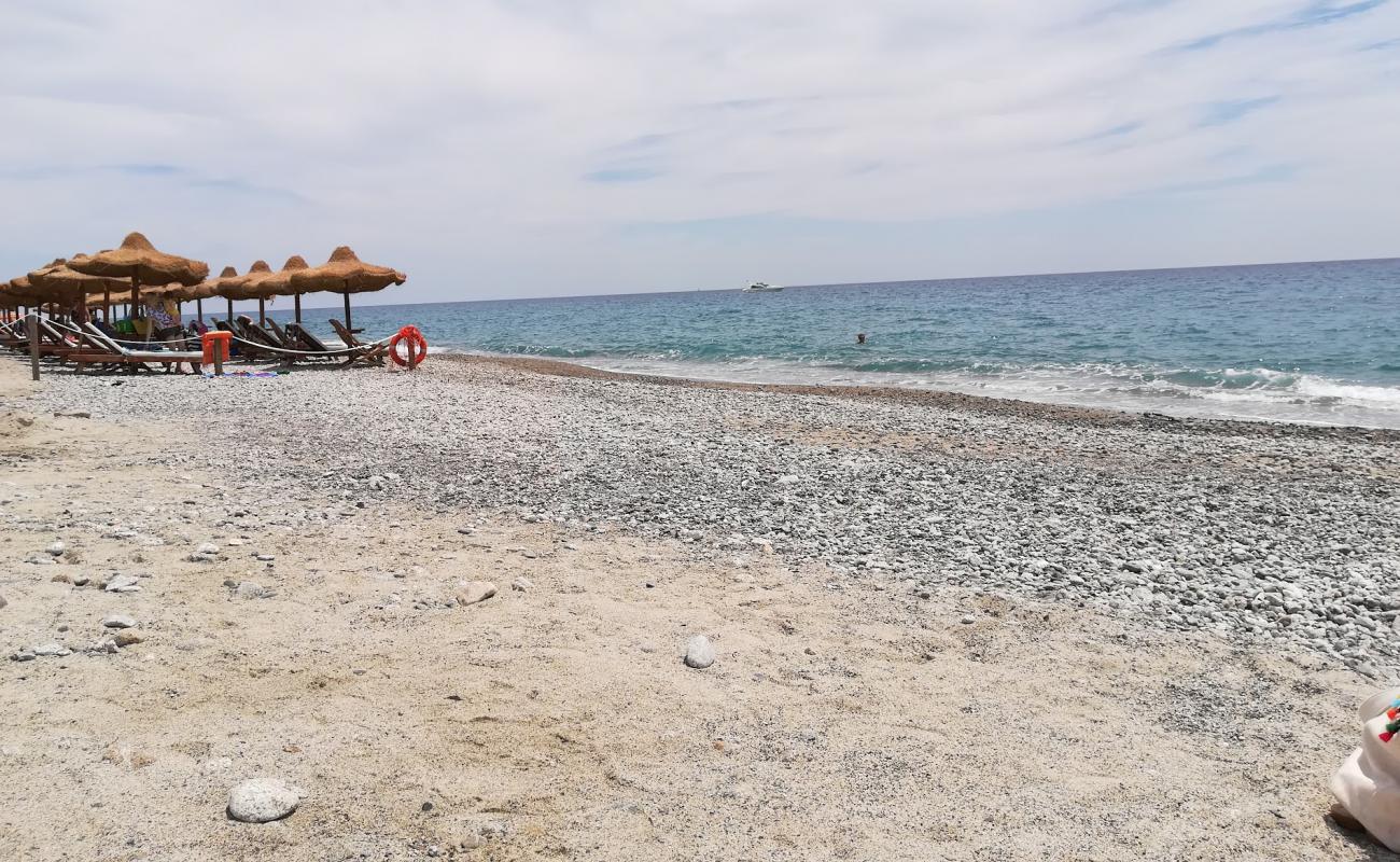 Foto de Riace Marina beach con guijarro fino oscuro superficie