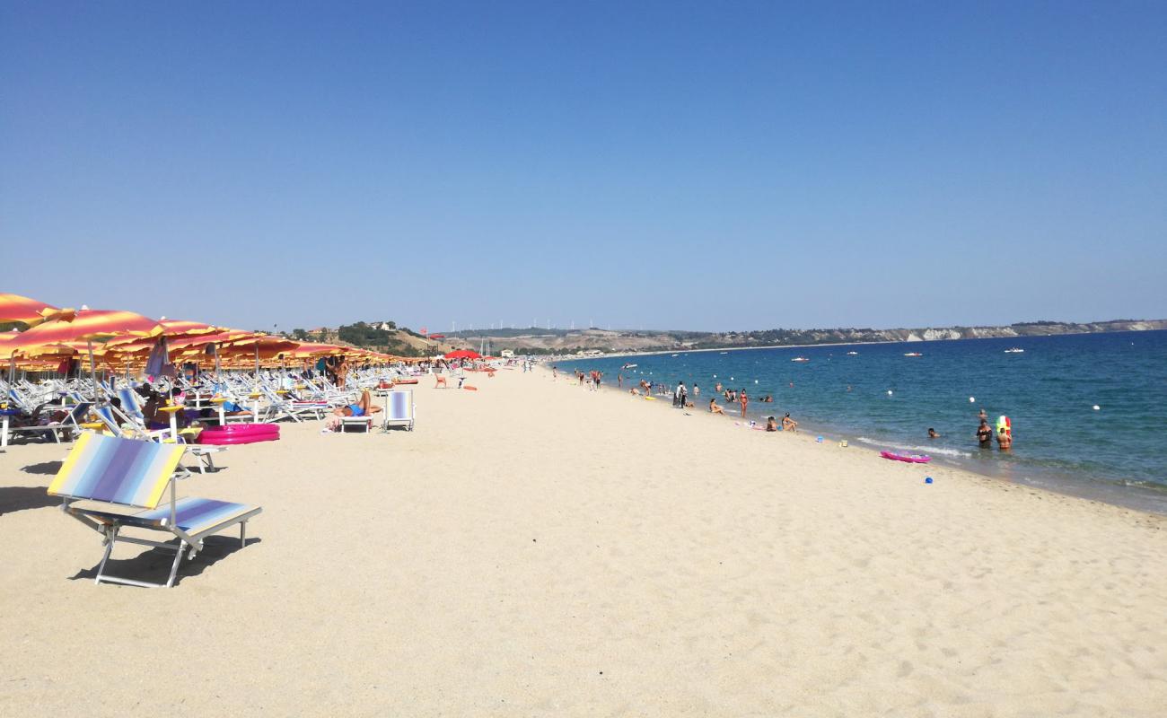 Foto de Playa Sereno con arena brillante superficie