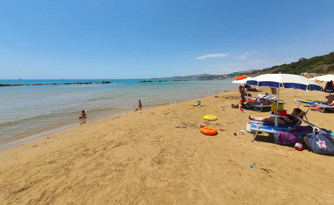 Foto de Lido Maddalusa con brillante arena fina superficie