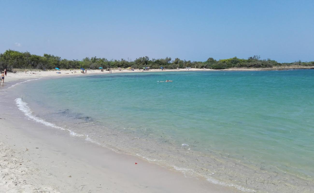 Foto de Spiaggia di Torre Guaceto con brillante arena fina superficie