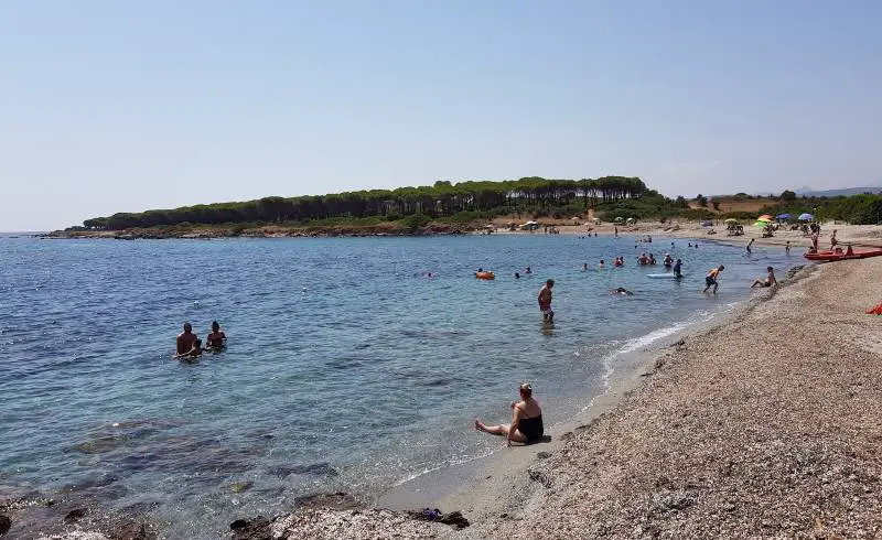 Foto de Porto Ottiolu II con arena fina y guijarros superficie