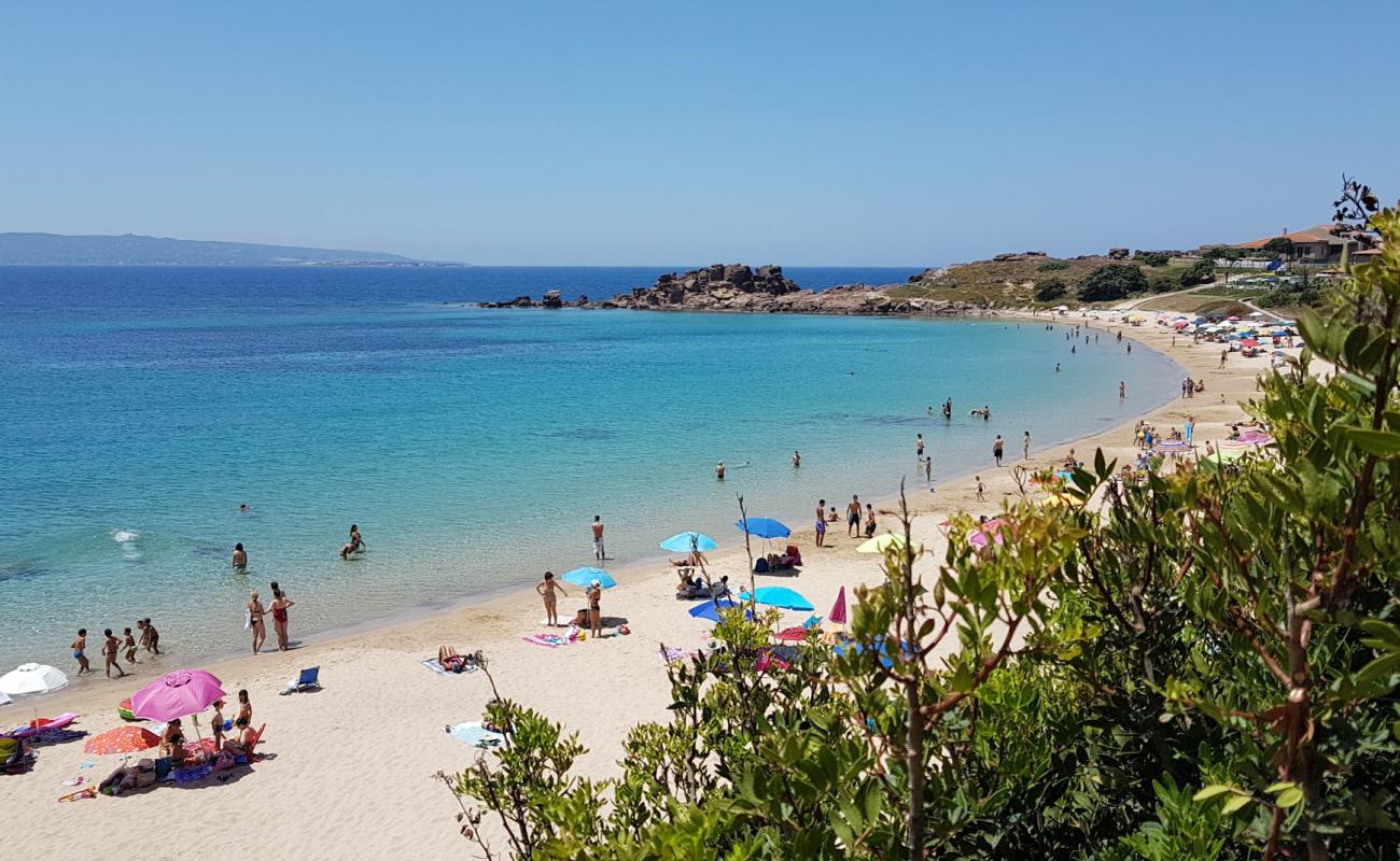 Foto de Portopaglietto beach con brillante arena fina superficie