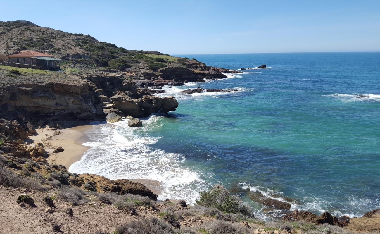 Foto de Cala Burantino con arena brillante superficie