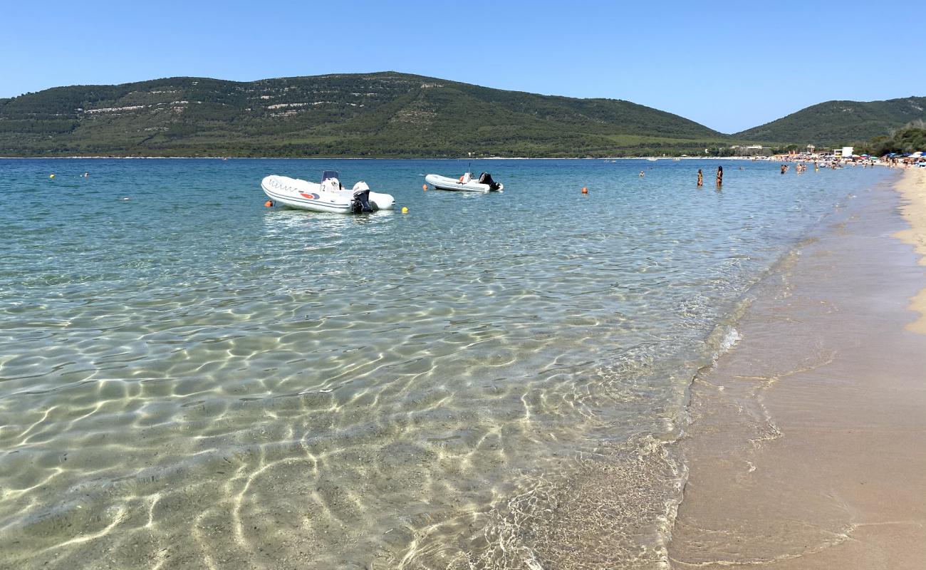 Foto de Playa de Mugoni con arena brillante superficie