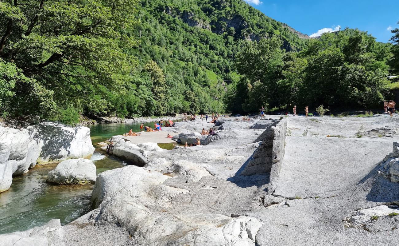 Foto de Playa Coston con piedra superficie