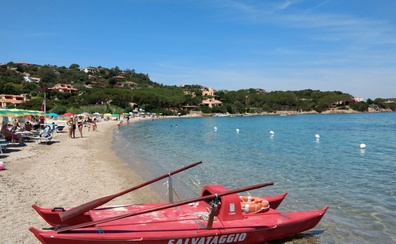 Foto de Cala Girgolu con arena brillante superficie