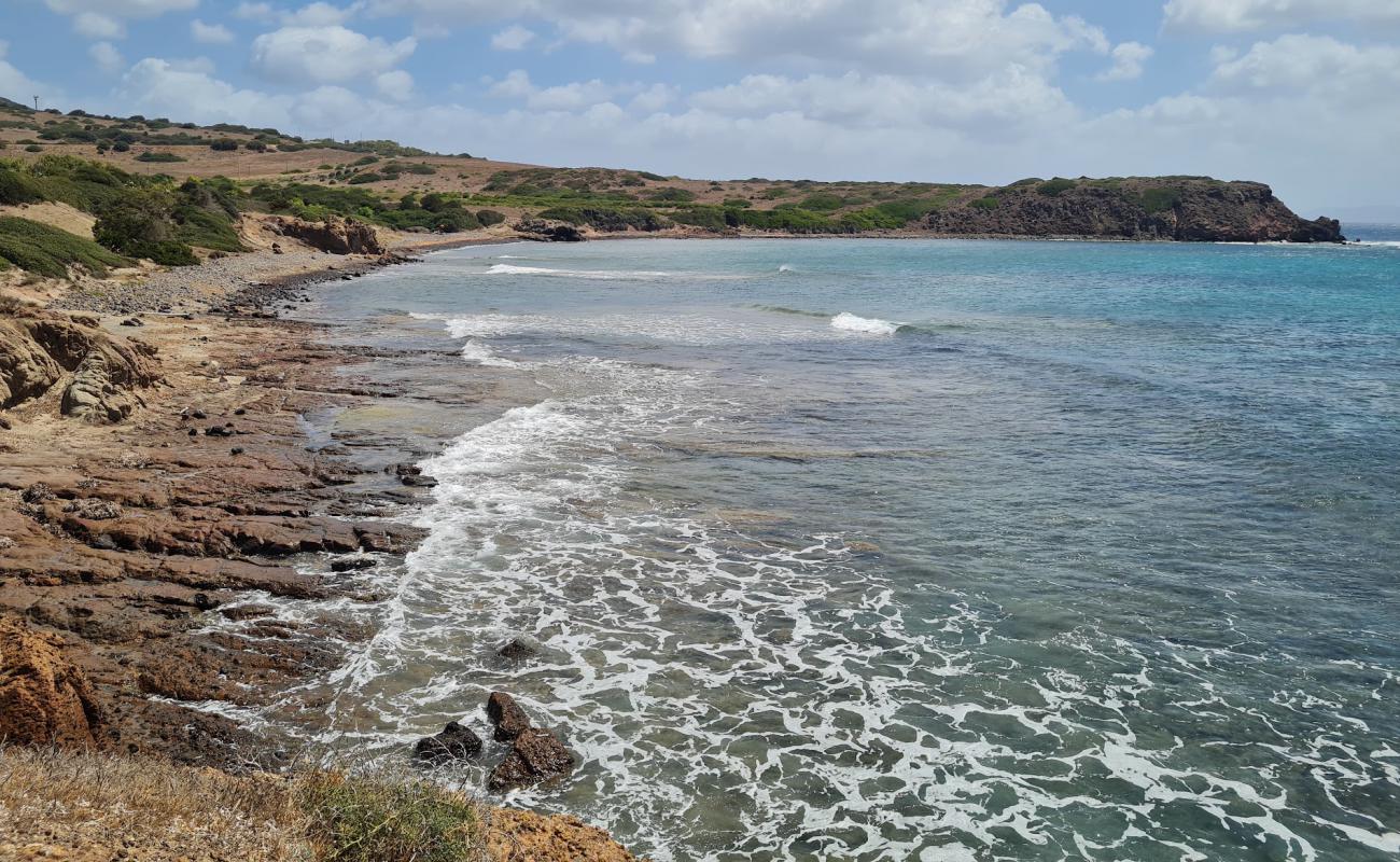 Foto de Spiaggia di Capo Sperone con arena gris y piedras superficie