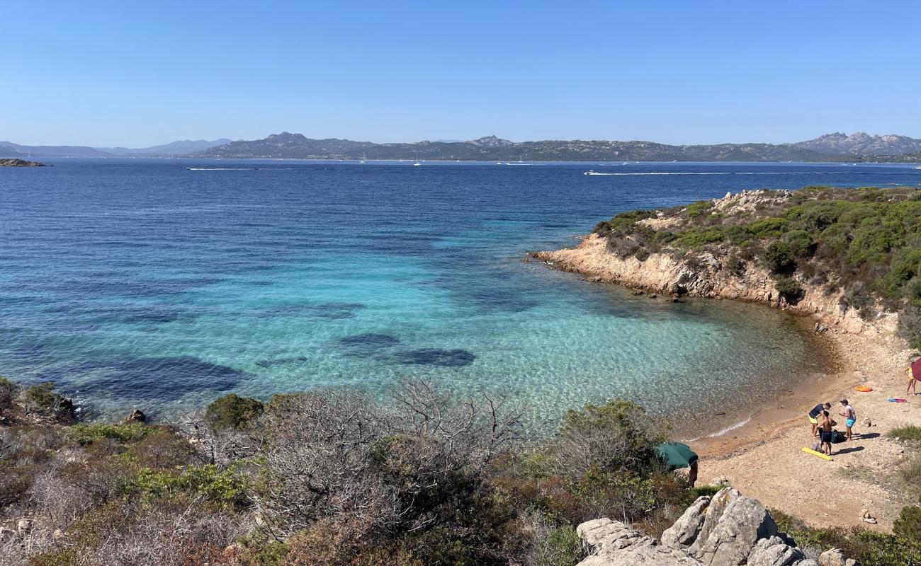 Foto de Cala Degli Inglesi con guijarro fino claro superficie