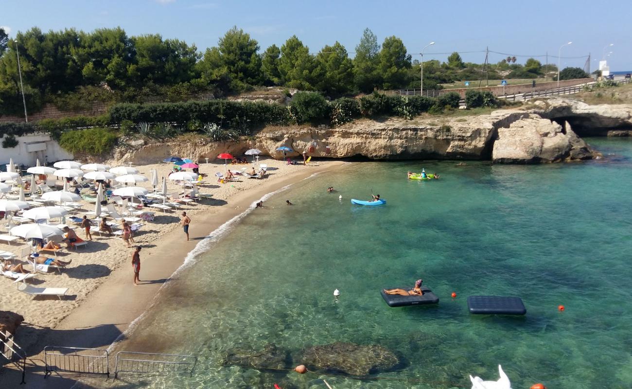 Foto de Porto Giardino Beach con arena brillante superficie