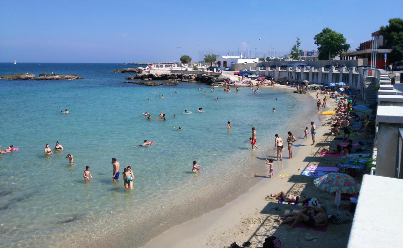 Foto de Spiaggia Cala Porta Vecchia con arena brillante superficie