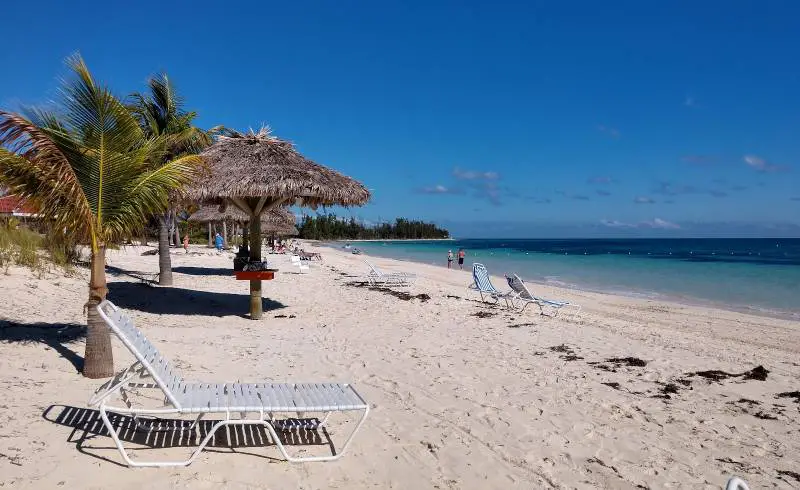 Foto de Taino beach con brillante arena fina superficie