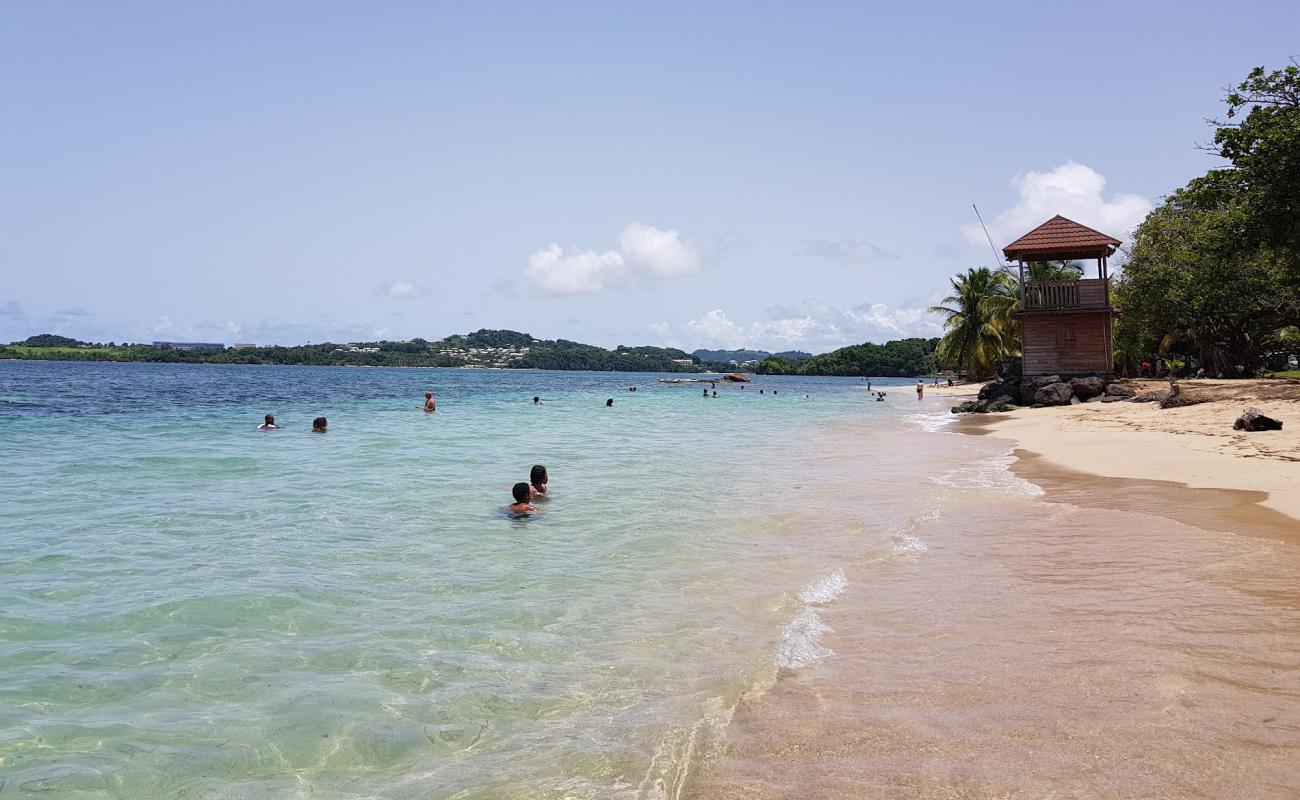 Foto de Plage de Trinite con arena brillante superficie