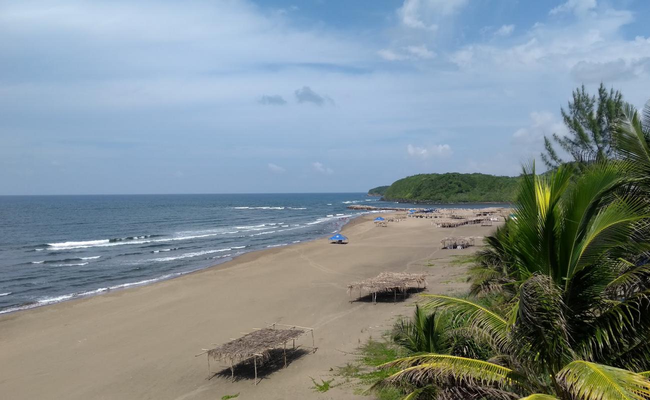 Foto de Playa de la barra con arena brillante superficie