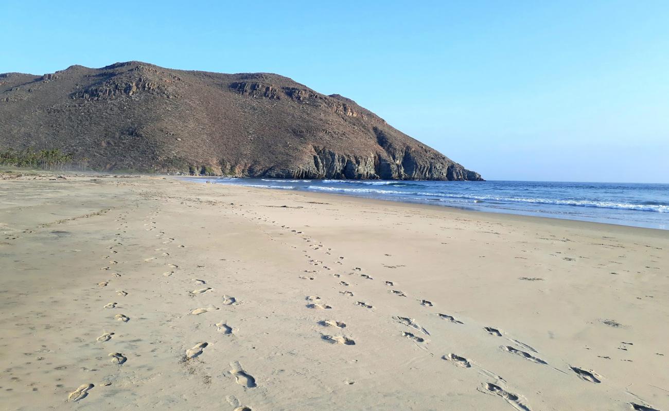 Foto de Playa Las Palmas con brillante arena fina superficie