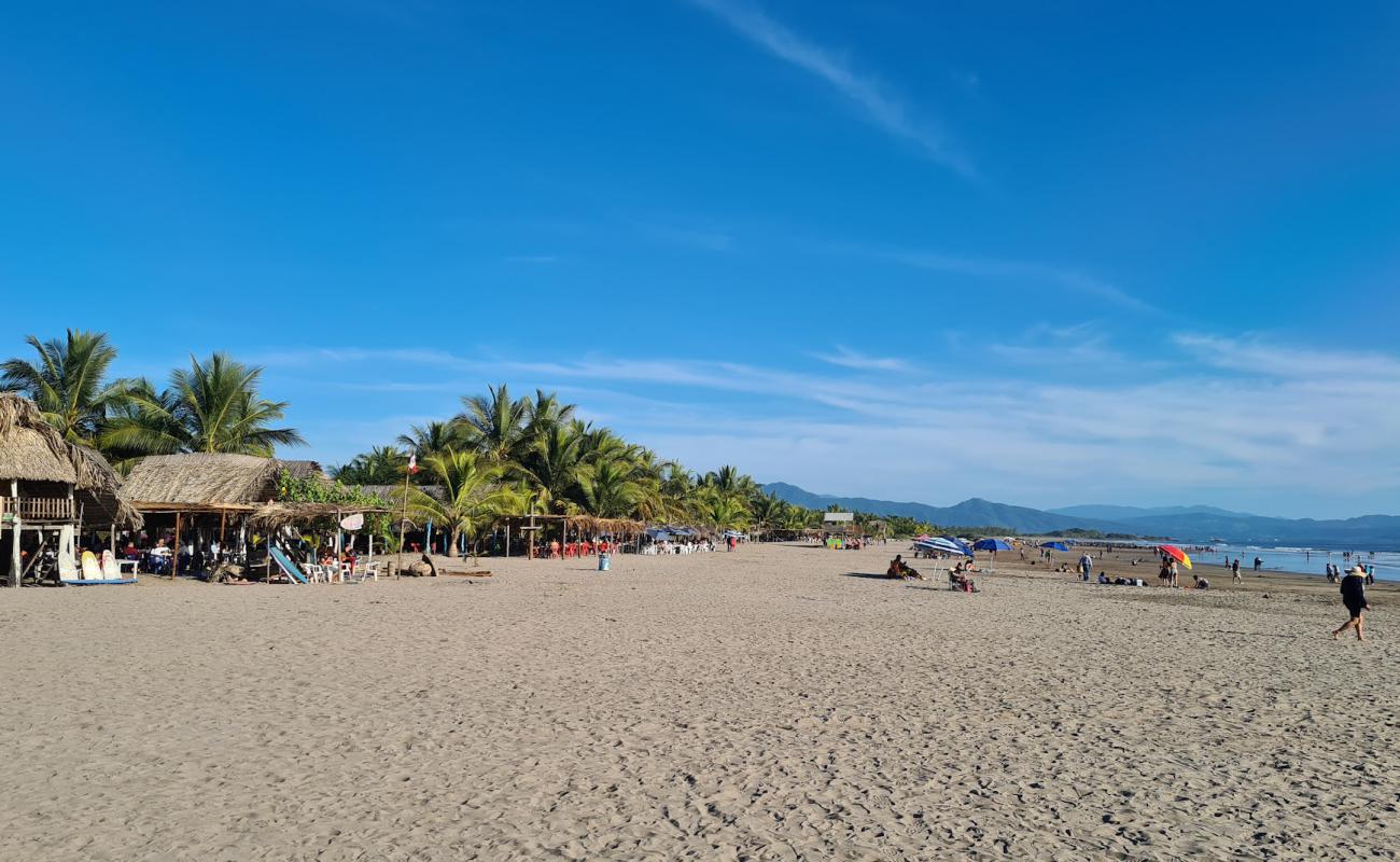 Foto de El Borrego beach con brillante arena fina superficie