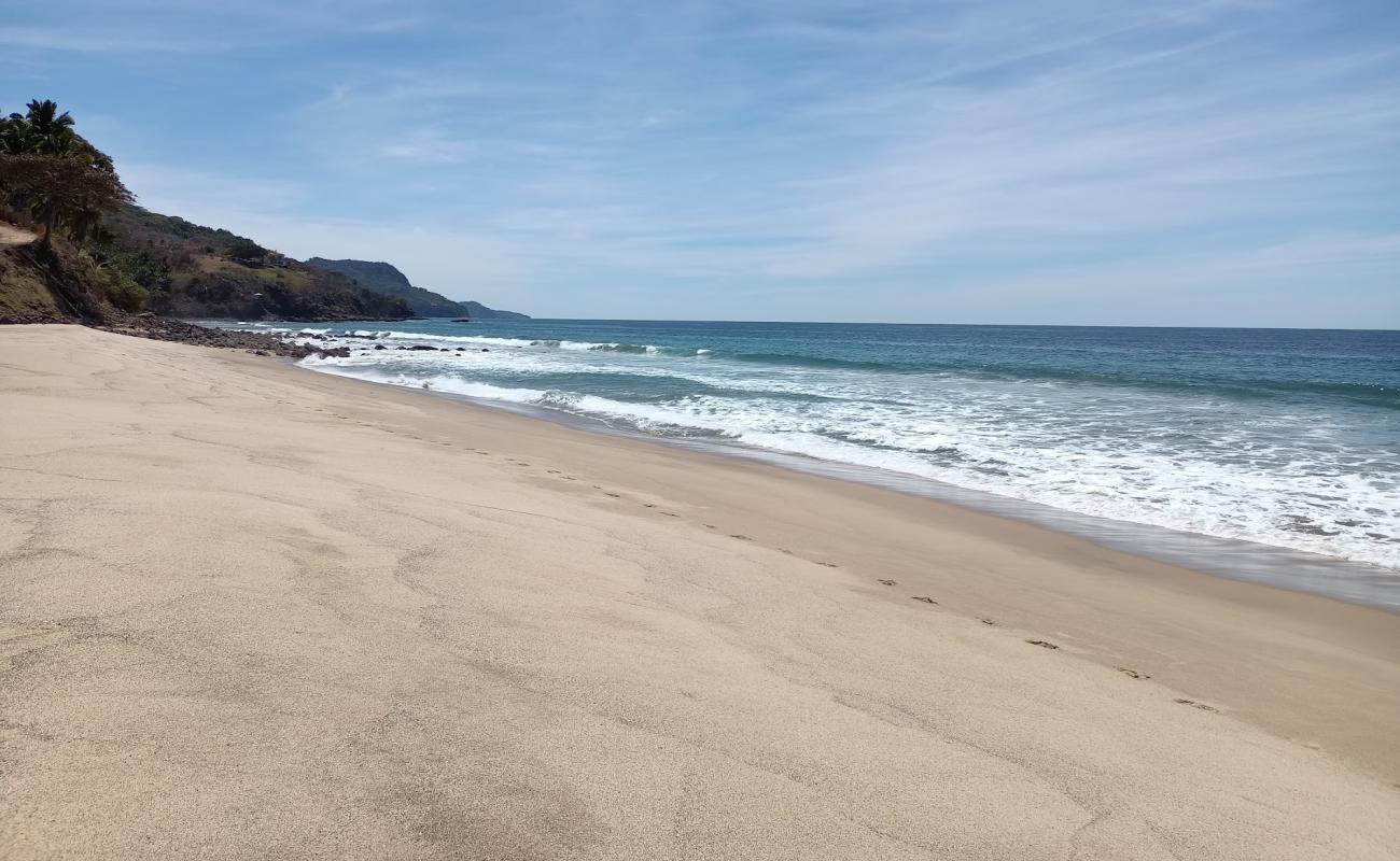 Foto de Punta Raza beach con brillante arena fina superficie