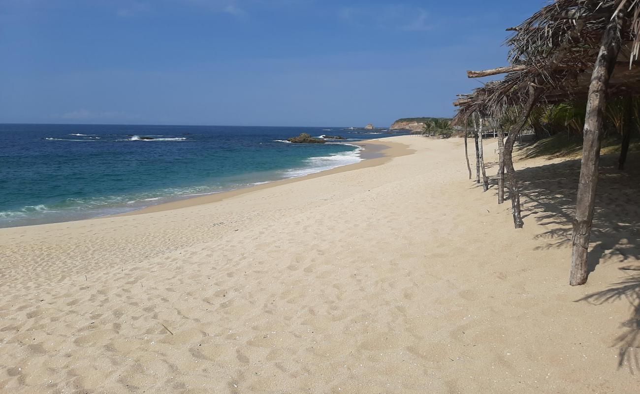 Foto de Playa La Palma Sola con arena brillante superficie