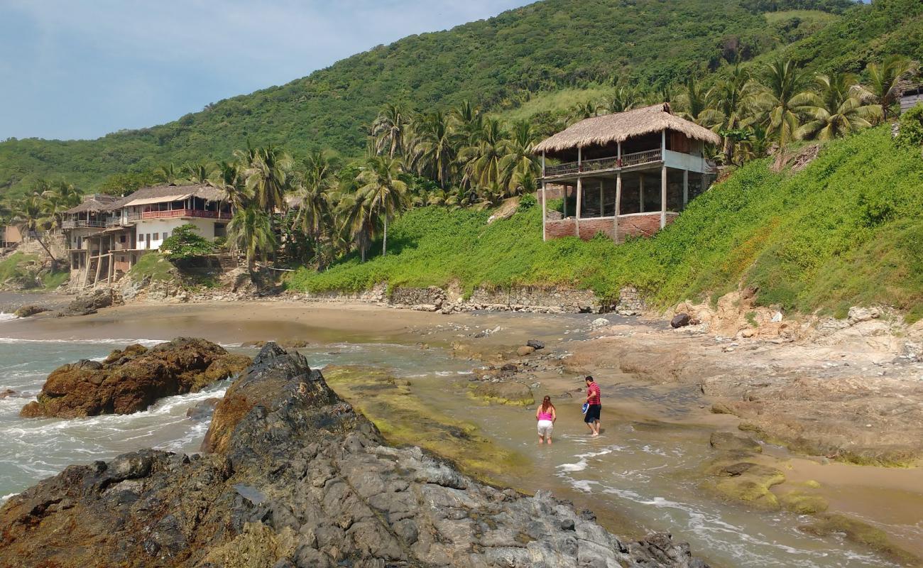 Foto de Playa Las Playitas con arena brillante superficie