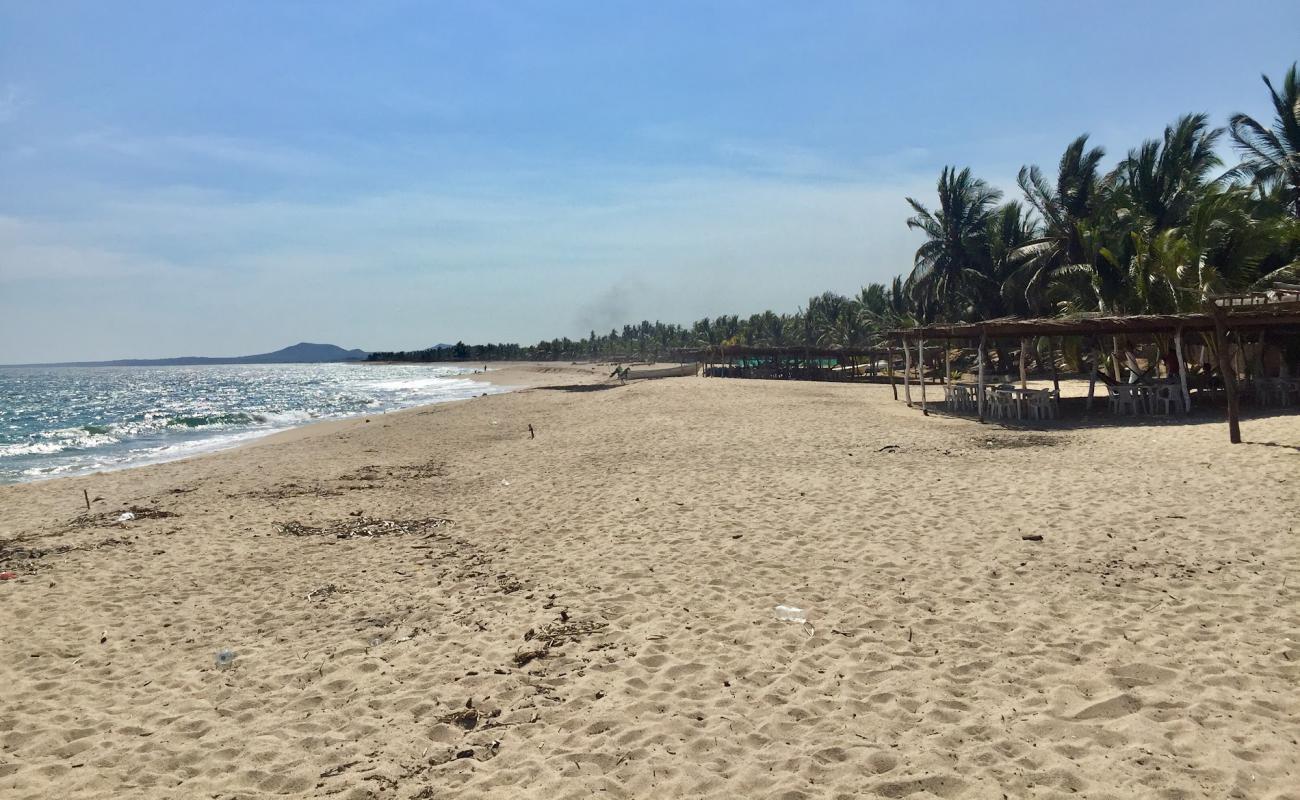 Foto de Palapa May con arena brillante superficie