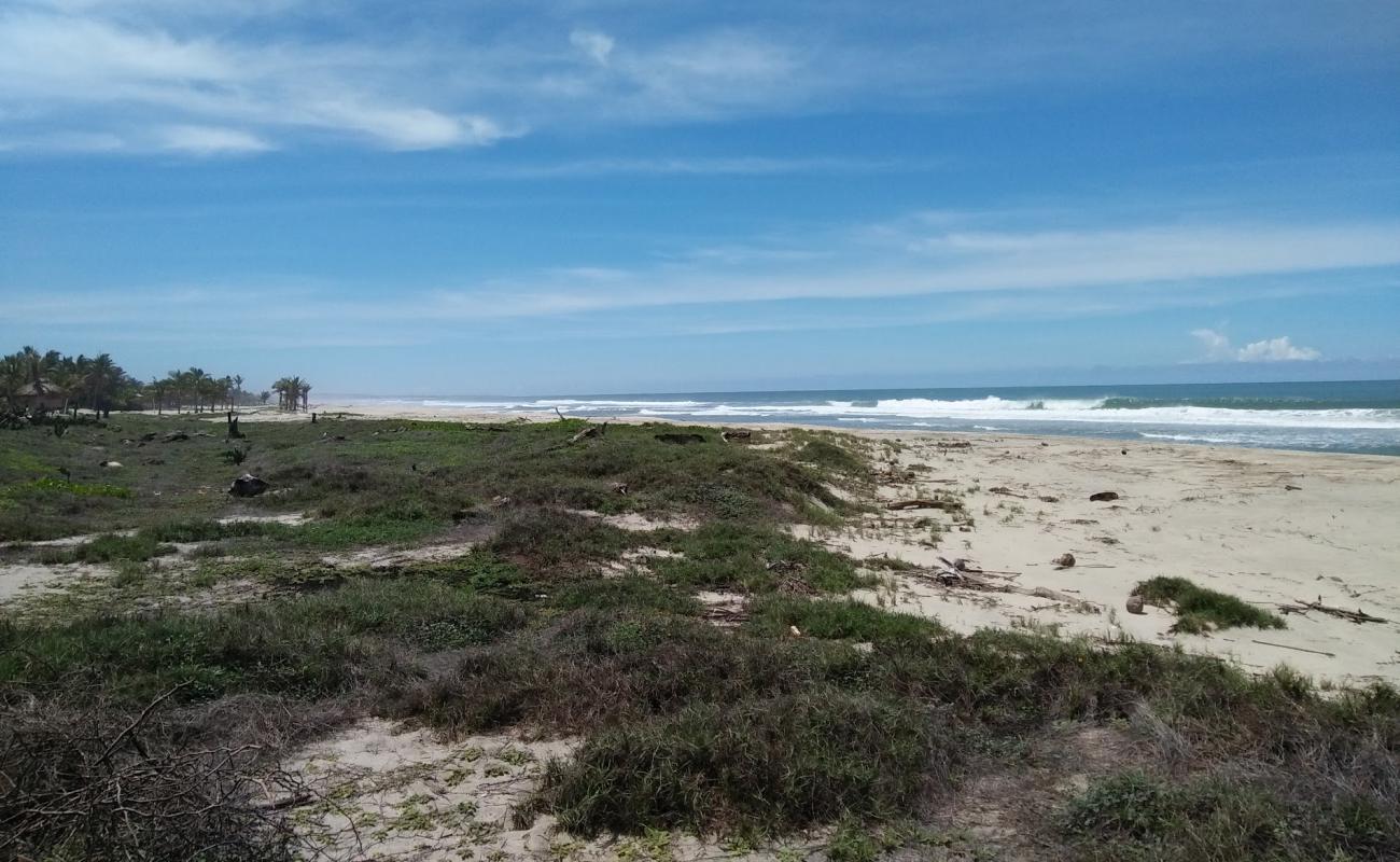 Foto de Playa Hornitos con brillante arena fina superficie