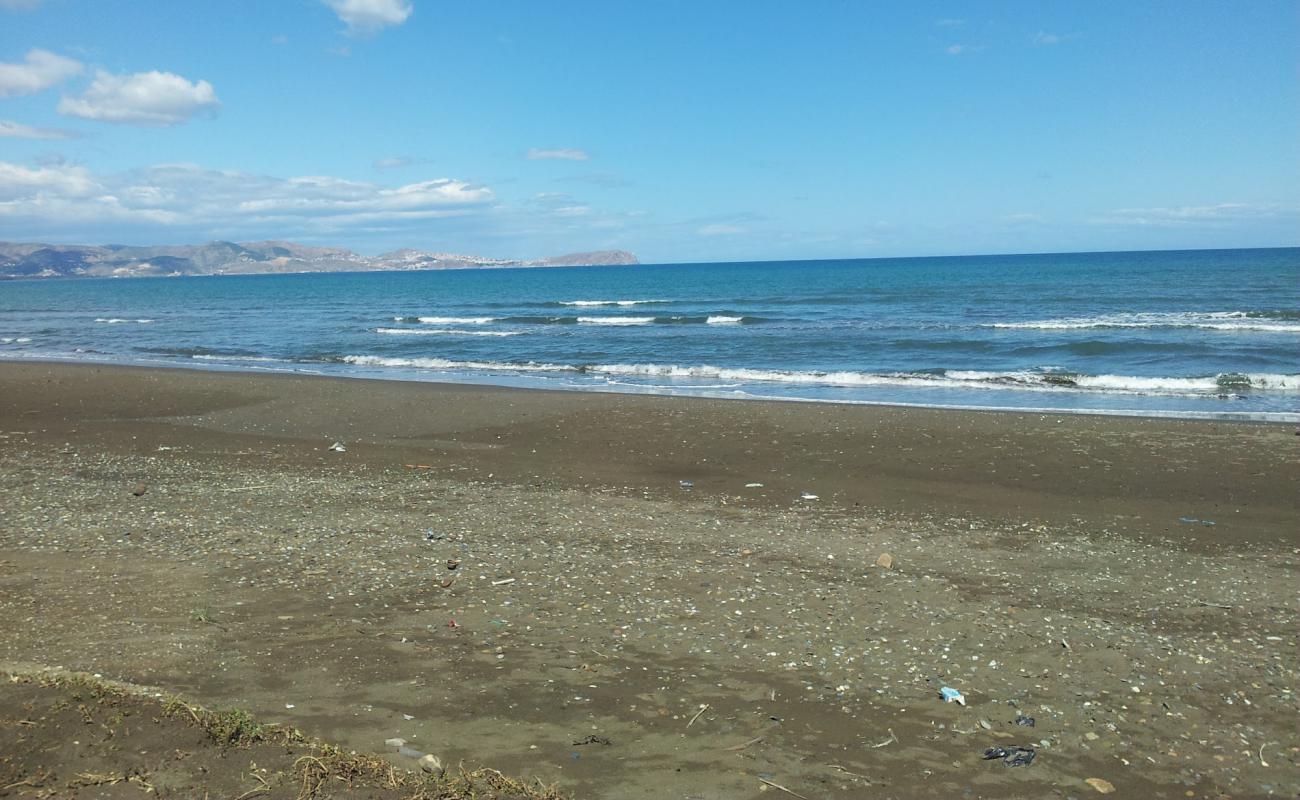 Foto de Plage Rush con arena oscura superficie