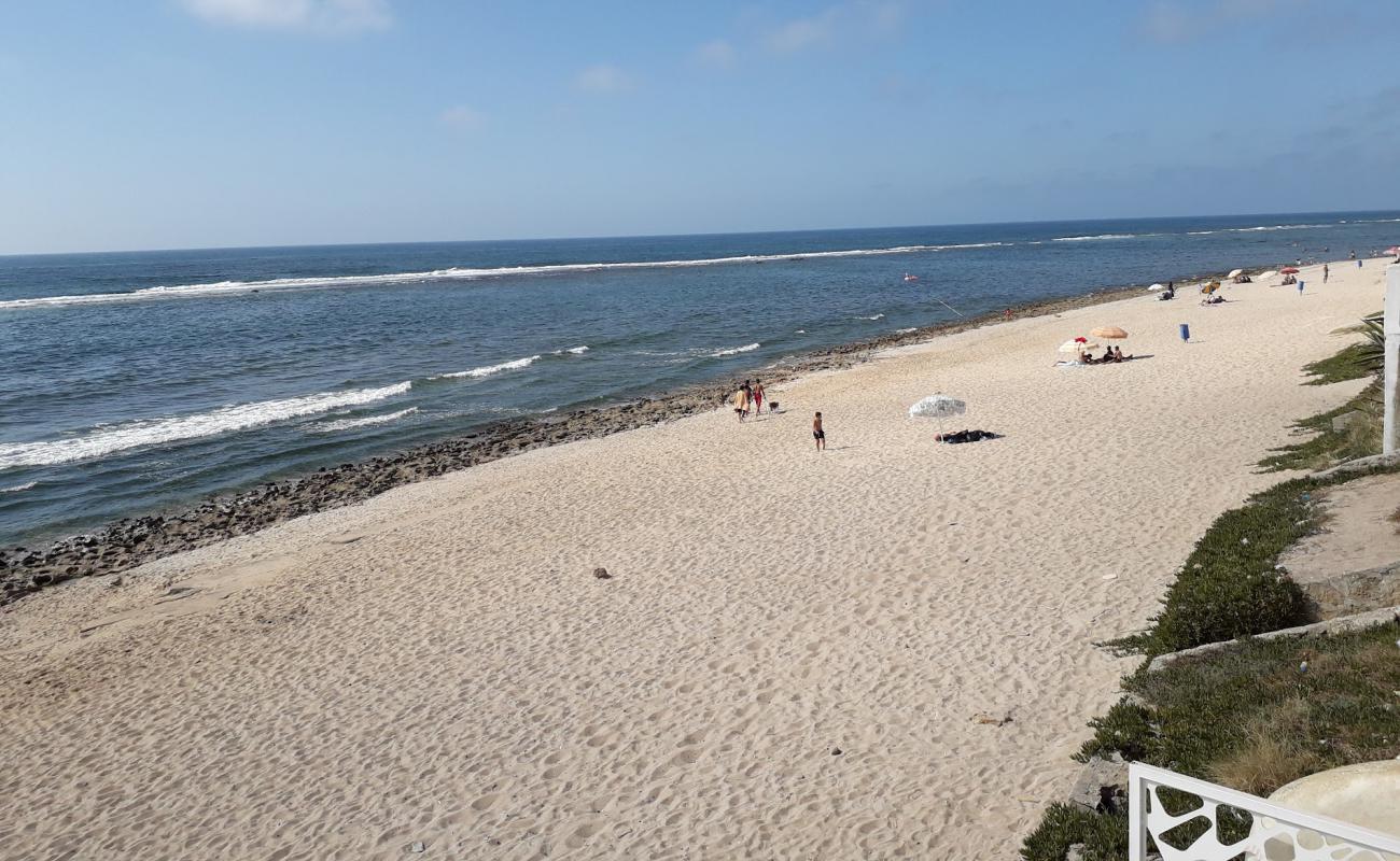 Foto de Plage Guy ville con arena brillante y rocas superficie